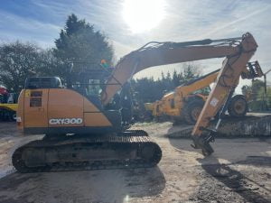 Clean 2019 CASE CX130D crawler excavator with yellow boom and steel tracks in the yard, built for demanding digging work.